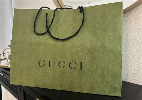 asciugamani gucci|gucci shopping bag.